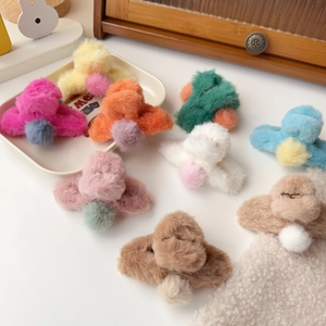 Plush faux rabbit fur claw clip with colorful pom-poms for various hair styles