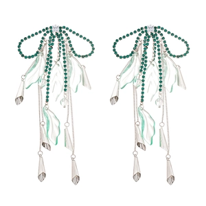 Elegant silver tassel earrings featuring green crystal bows and translucent leaf charms