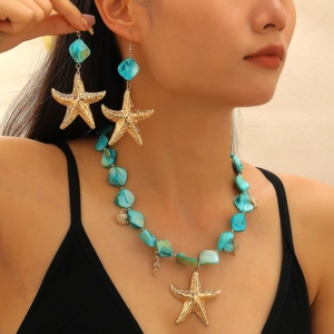 Set gioielli stella marina con perle blu, collana cavalluccio marino dorata e orecchini