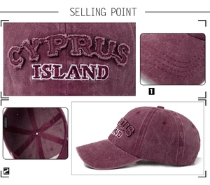 Detail view of burgundy washed cotton baseball cap with Cyprus Island embroidery