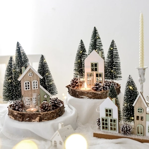 Nordic wooden Christmas house set with miniature snowy trees and natural pine cones