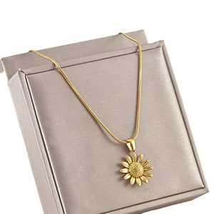 Golden sunflower pendant necklace with detailed petals on elegant gold snake chain jewelry