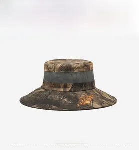 Detail of outdoor sun hat with breathable mesh band and woodland camouflage print