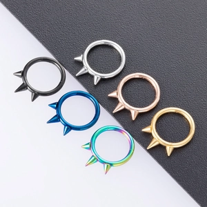 Set of 6 punk septum clicker rings with spikes in black, gold, and silver finishes