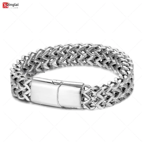 Macro view of a 10mm double layered stainless steel cuban chain with polished buckle clasp