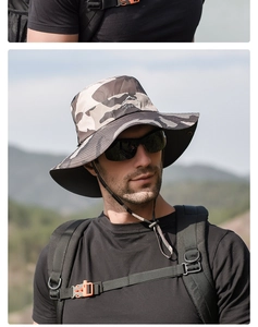 Detailed view of camouflage outdoor sun hat with Sport embroidery and chin strap