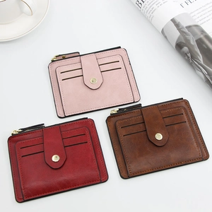 Slim pink and red card holder wallets with zipper pocket and snap button closure