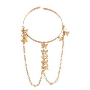 Gold butterfly tassel arm cuff featuring layered metallic fringe and butterfly charms