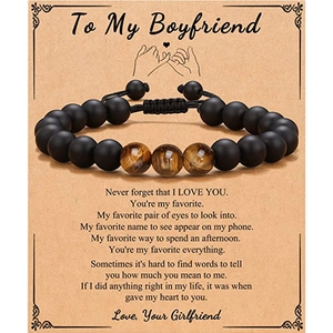 Men's matte black beads and tiger eye stone adjustable bracelet on a gift card