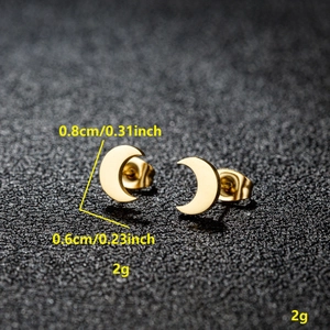 Macro view of gold moon stud earrings with size dimensions and weight info