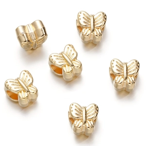Detailed view of gold butterfly CCB beads with large holes for DIY jewelry making