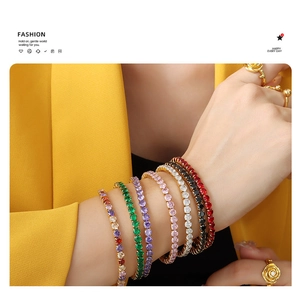 Close-up of multicolor zircon elastic bracelets with gold plated stainless steel accents