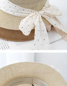 Détail du chapeau de paille avec ruban à pois et cordon de serrage réglable