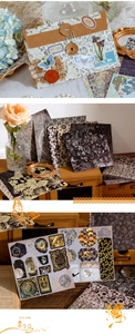 Dettaglio macro di carta scrapbooking vintage con motivi floreali e farfalle dorate