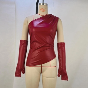 Detail of burgundy PU leather one-shoulder top with matching long fingerless gloves