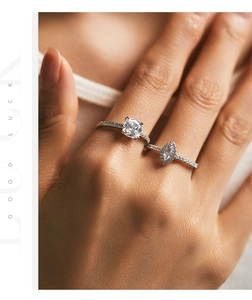 Close-up of s925 silver rings with princess and marquise cut cubic zirconia diamonds