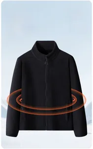 Close-up of black fleece jacket with high collar and warm insulated lining texture