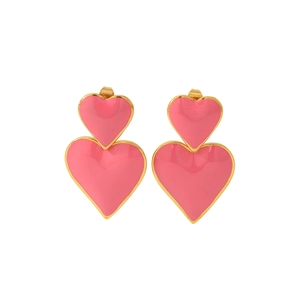 Detailed close-up of pink layered double heart earrings with elegant gold plating