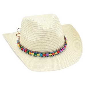 Detail of a beige straw cowboy hat featuring a colorful beaded band and woven texture