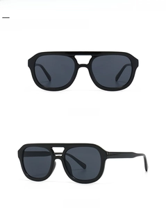 Close-up of modern retro square flat top aviator sunglasses with glossy black frames