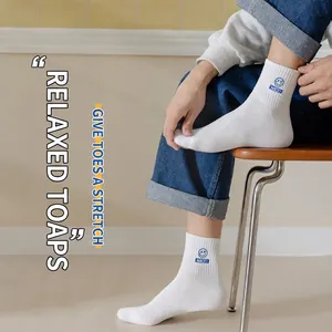 White ribbed mid-calf sports socks with blue smiley face and NICE embroidery detail