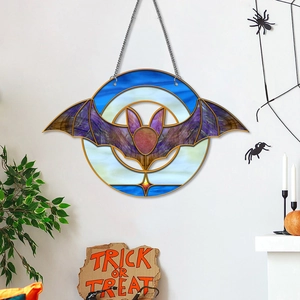 Detail of acrylic Halloween bat ornament with metal chain and Trick or Treat sign