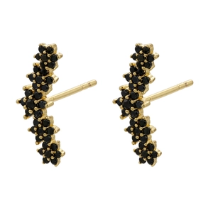 Detail of flower shaped earrings with black crystals and 18K gold plated finish