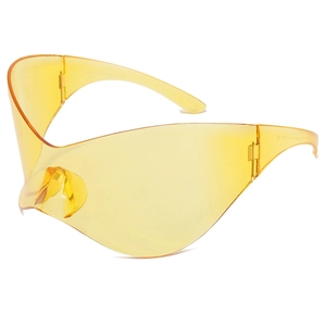 Detailed view of yellow oversized Y2K sports visor sunglasses with wraparound shield lens