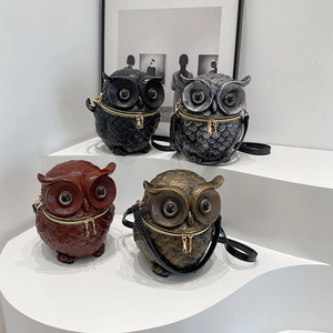 Chic owl shaped embossed crossbody bag in black silver bronze and brown colors