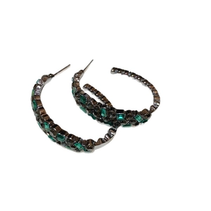 Sparkling C-shaped earrings with emerald green gemstones and vintage crystal studs