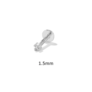 Macro shot of 1.5mm silver S925 sterling silver four-prong diamond cartilage stud earring