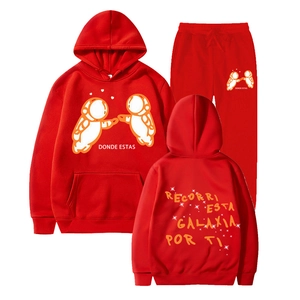 Red Ivan Cornejo hoodie set featuring astronaut graphics and Donde Estas text print