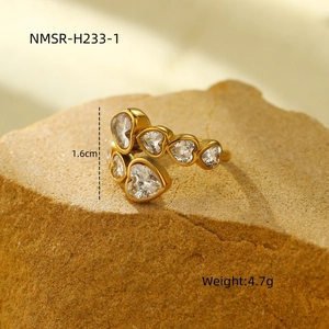 Detail shot of gold heart ring with cubic zirconia showing 1.6cm height and 4.7g weight