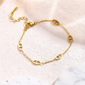 Minimalist gold titanium steel chain bracelet with five hollow pig nose oval links for women