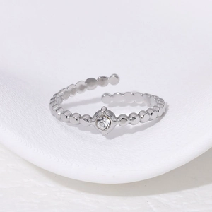 Minimalist silver bubble ring with center crystal stone and open adjustable design