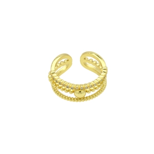 Detail of layered gold open ring featuring zircon pave and twisted texture bands