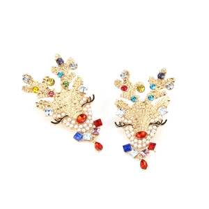 Golden Christmas reindeer earrings with colorful rhinestones and decorative white pearls