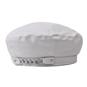 Close-up of white PU leather beret featuring a silver metal chain and stitch details