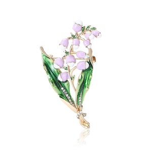 Exquisite gold-plated lily of the valley brooch with purple enamel and tiny rhinestones