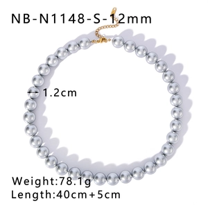 Detail of 12mm grey pearl necklace with golden clasp and size specifications on white