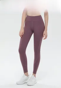 Detailansicht lila Yogahose mit hoher Taille, Formnähten und breitem Kompressionsbund