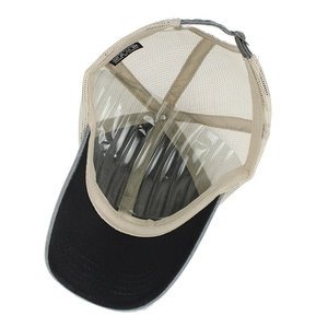 Detail view of cotton baseball cap interior with mesh back and quality care label