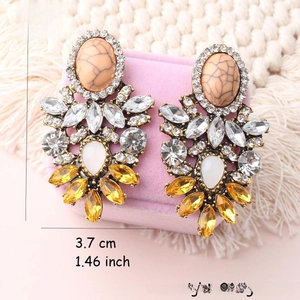 Detail view of floral crystal drop earrings with vintage style and dimension markings