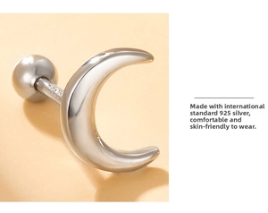 Macro view of S925 sterling silver moon screw back studs with polished mirror finish