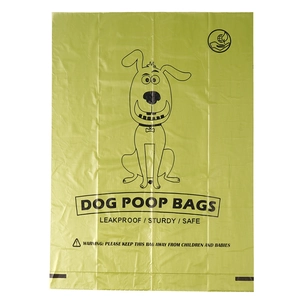 Flat lay of leakproof green biodegradable dog poop bag with printed safety warnings
