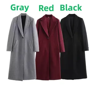 Flat lay of wool blend coats in grey, red, and black with classic lapels and pockets