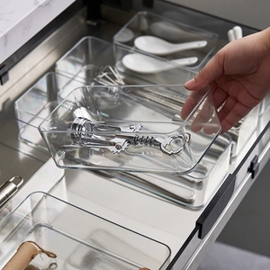 Clear acrylic drawer organizers in various sizes for kitchen cutlery and utensil storage