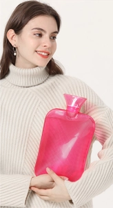 Detailed view of pink PVC hot water bottle with diamond texture for hand warming