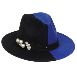 Detail of black and blue gradient wool felt fedora featuring pearls and floral accents