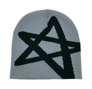 Close-up of gray knitted beanie showing black star pattern and detailed wool texture
